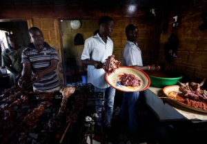 Nigerian meat being grilled into suya, cooked by locals in Lagos
